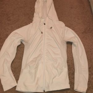 White athletic jacket with cutout and hood